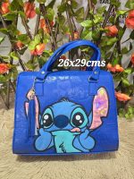 cartera con broche stitch