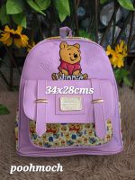 mochila plaquita en medio pooh