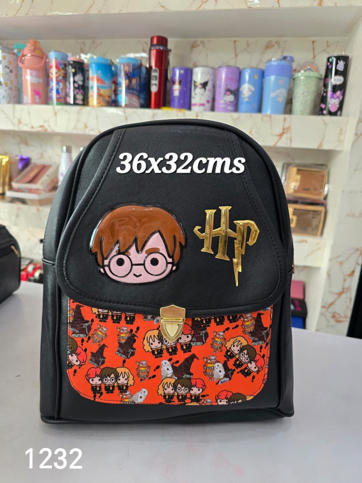 2026/03/1000006085.jpg mochila 3d Harry broche - Imagen 1