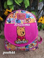 mochila plaquita arriba Pooh