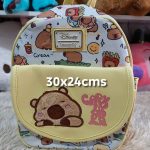 mochila placa arriba capibara