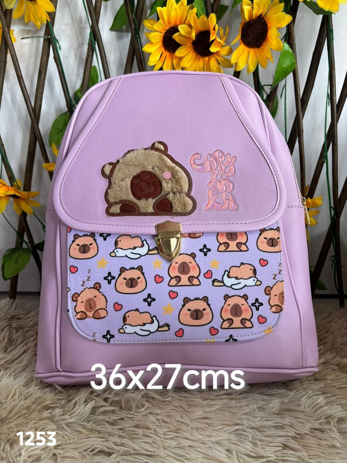 2026/03/1000006237.jpg mochila 3d capibara broche - Imagen 1