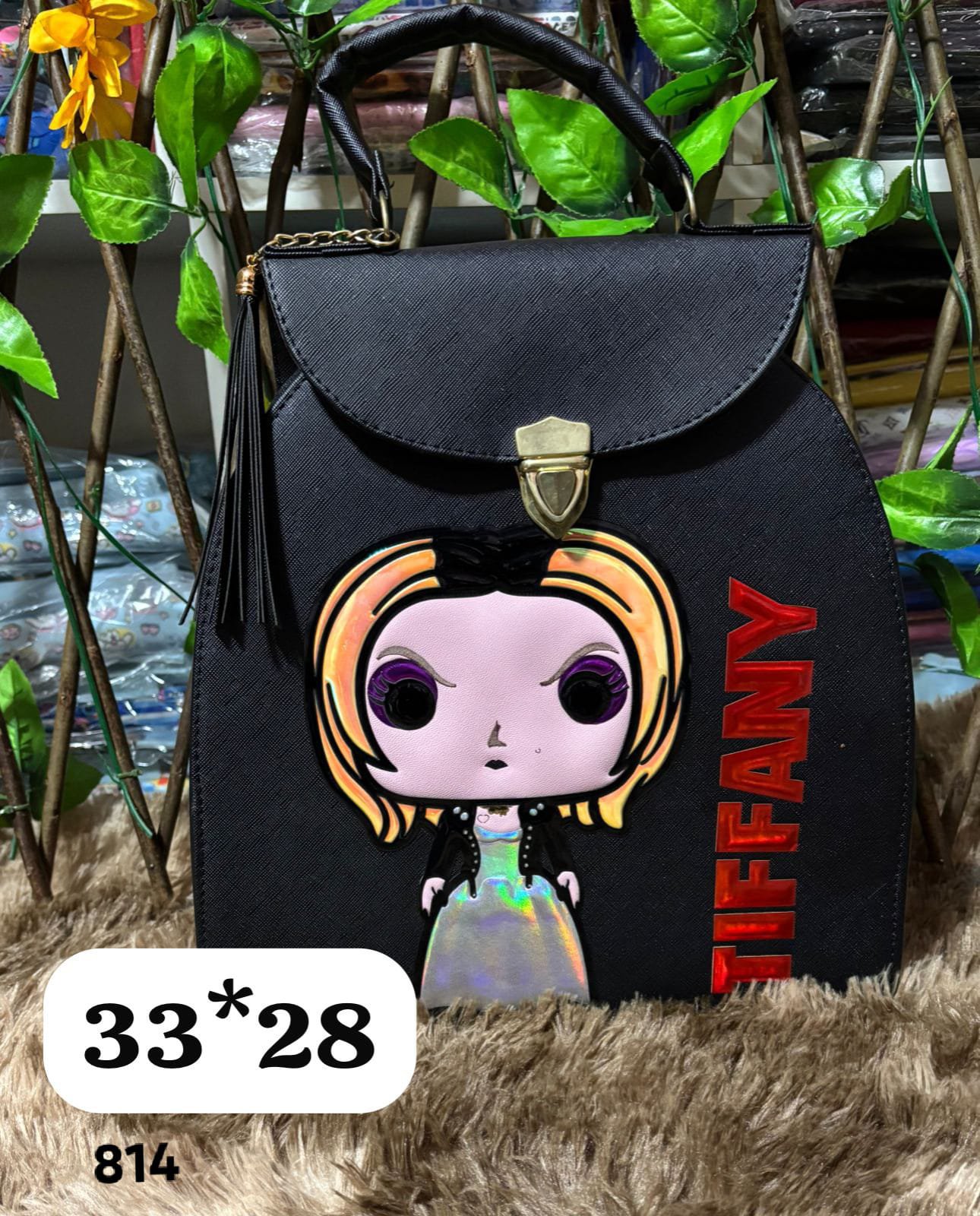 2026/03/1000007039.jpg cartera mochila Chucky - Imagen 1