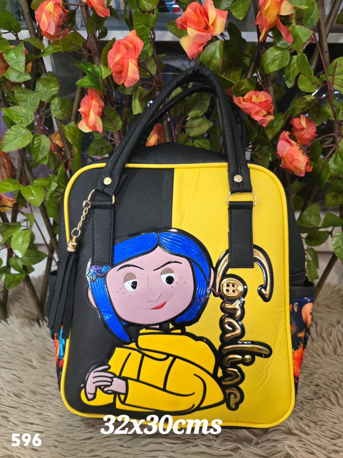 2026/03/1000007611.jpg cartera doble asa coraline - Imagen 1